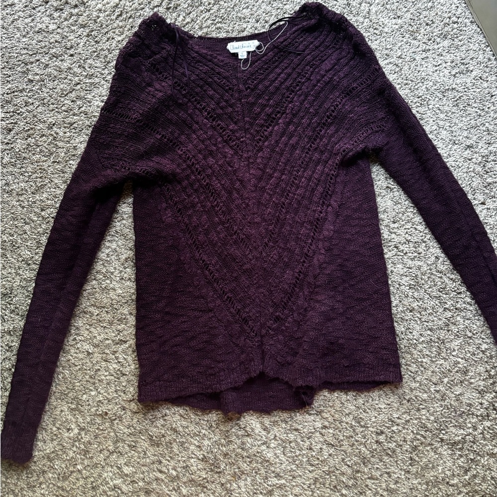 Purple sweater with designed front